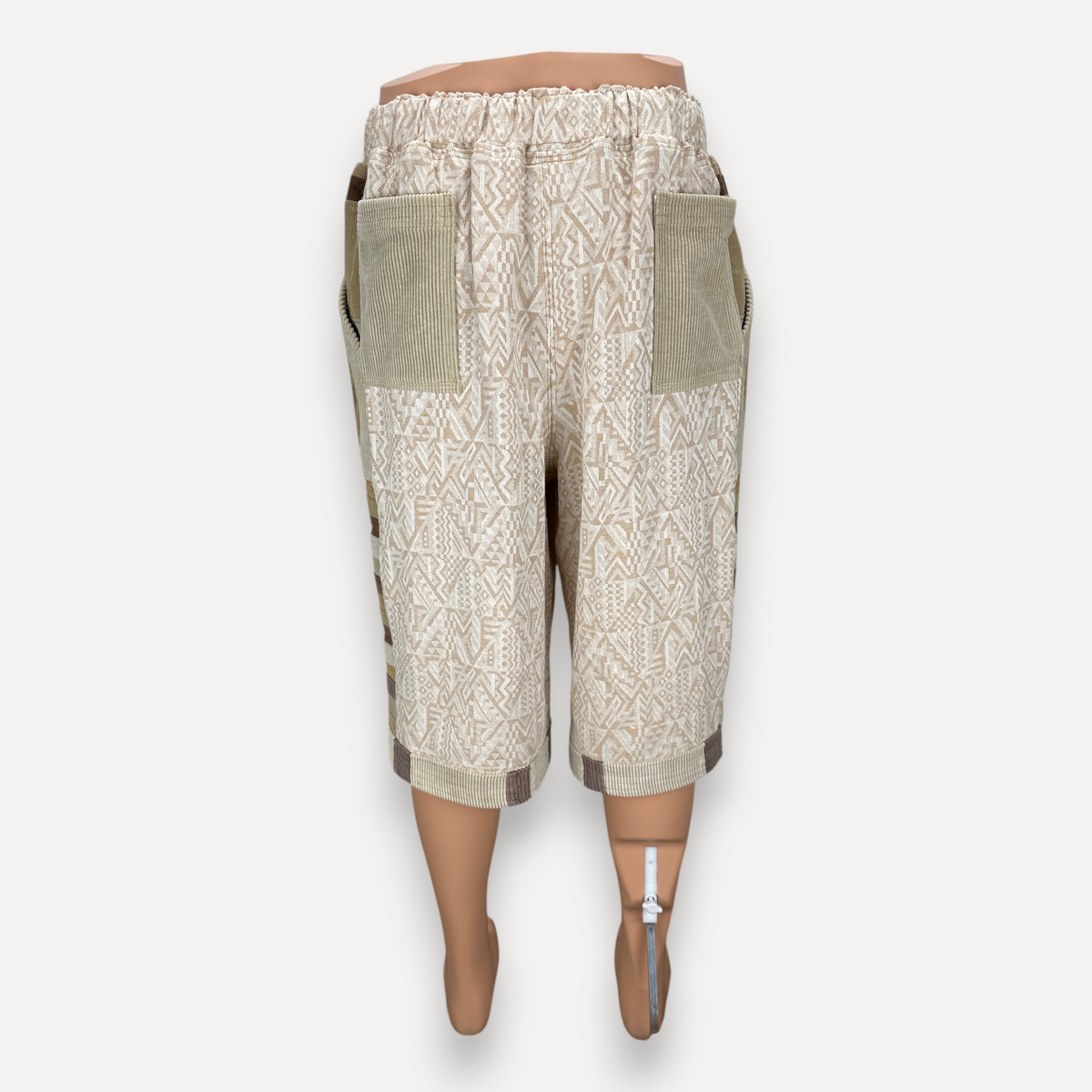 nowAwear medium length shorts in beige geometric print cotton with contrasting corduroy pockets and elastic waistband