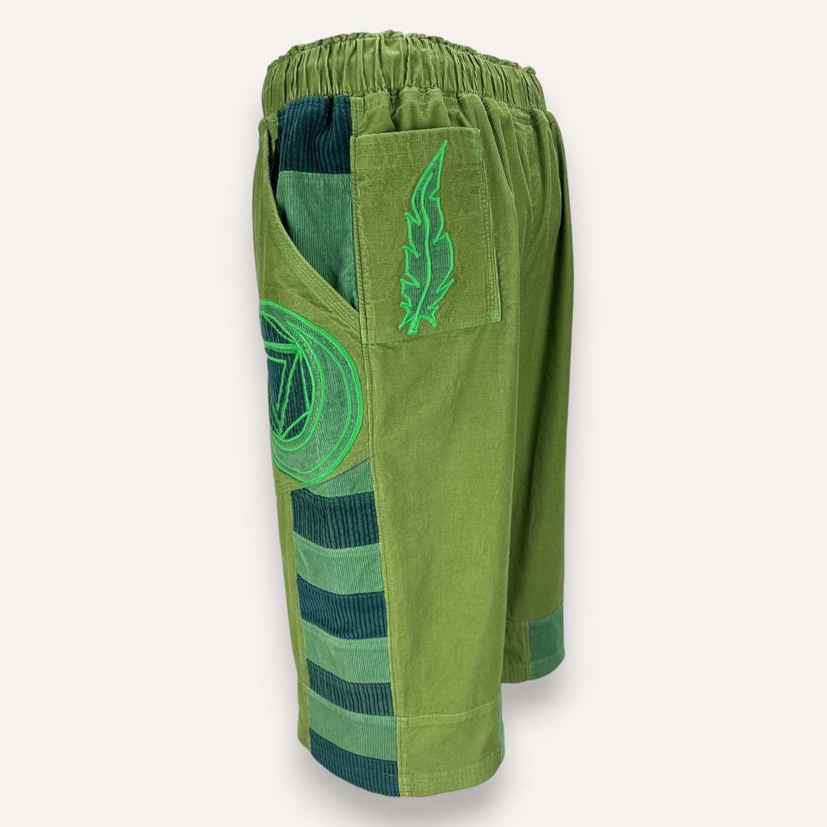 nowAwear medium green corduroy shorts featuring a leaf embroidery, side pockets, and striped panel detailing.
