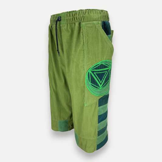 nowAwear medium green corduroy shorts with a drawstring waist, side pockets, and a geometric triangle patch design.