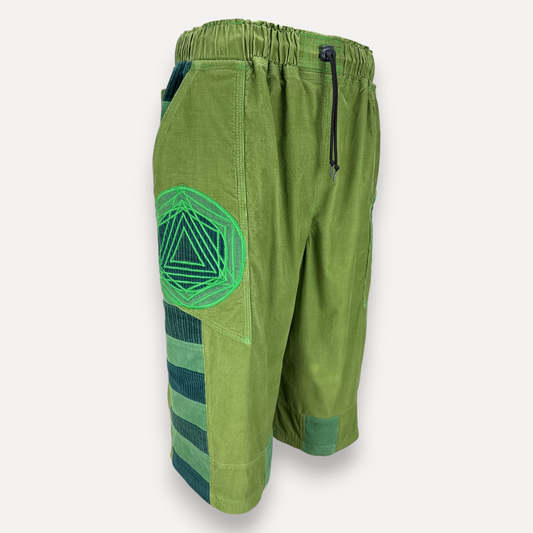 nowAwear medium green corduroy shorts featuring a geometric triangle patch and elastic drawstring waistband.