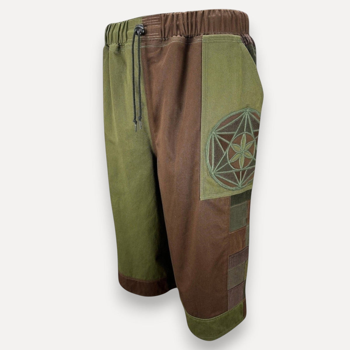 nowAwear olive green and brown patchwork shorts with a geometric flower embroidery and an elastic drawstring waist
