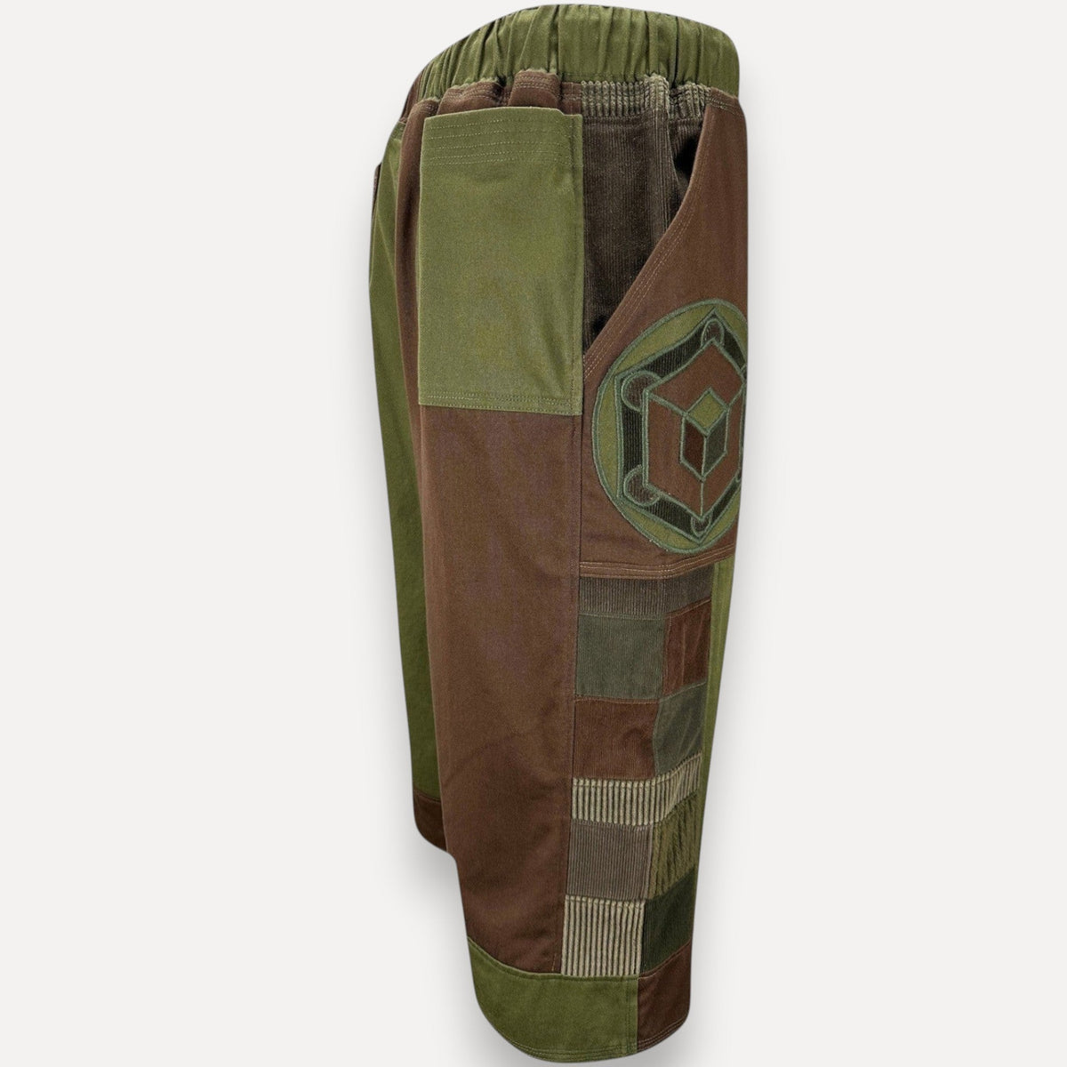 nowAwear patchwork shorts in olive green and brown corduroy with a geometric embroidered side pocket